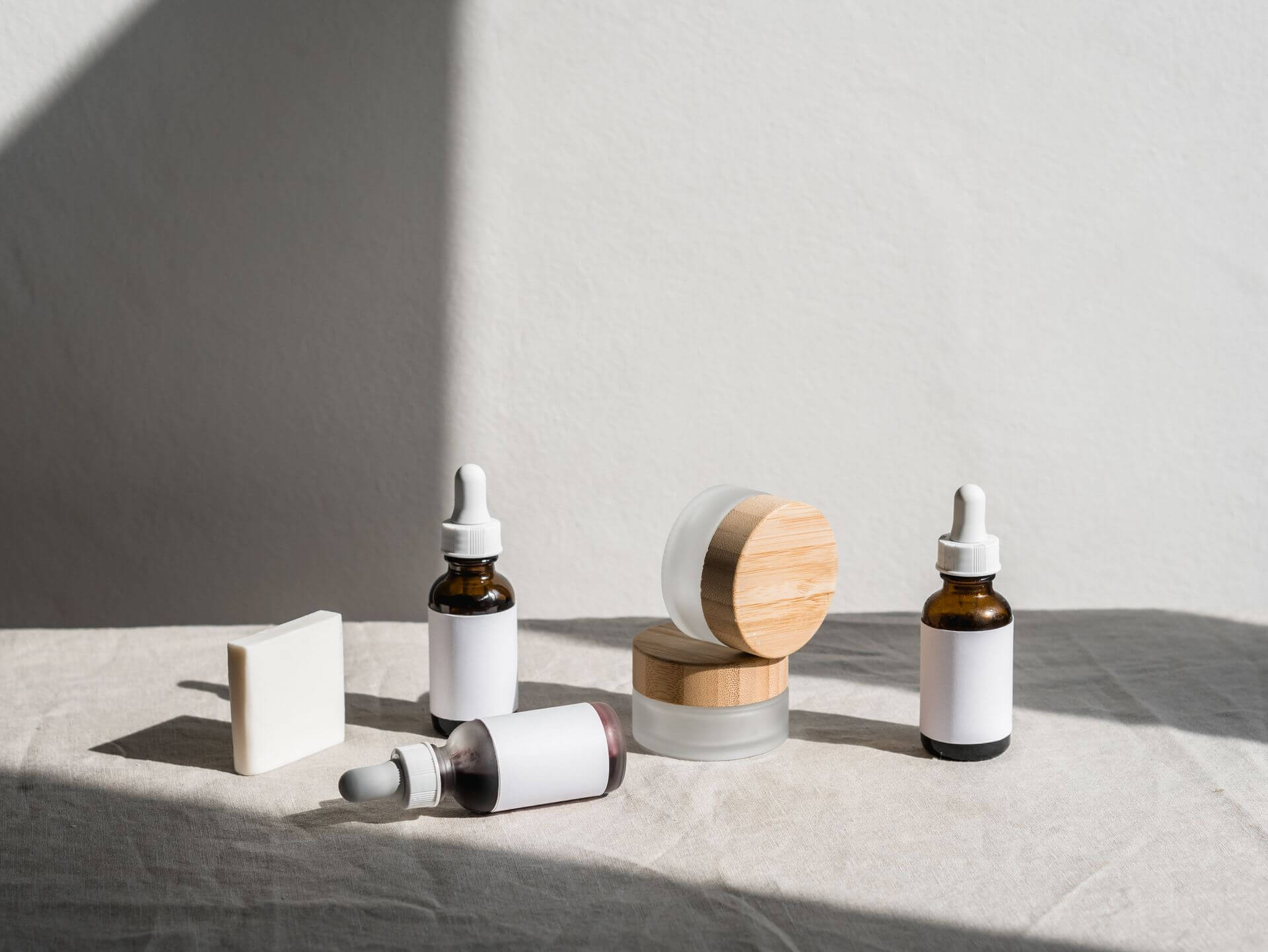 Skincare bottles and natural ingredients